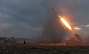 Ukrainian servicemen launch a Grad rocket towards pro-Russian separatist forces outside Debaltseve, eastern Ukraine
