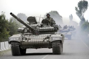 Georgian tanks move along a road near the city of Tskhinvali 100 km (62 miles) from Tbilisi